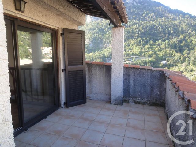 Afficher la photo en grand Appartement F3 à louer - 3 pièces - 47.28 m2 - LE BROC - 06 - PROVENCE-ALPES-COTE-D-AZUR - Century 21 Optimmo